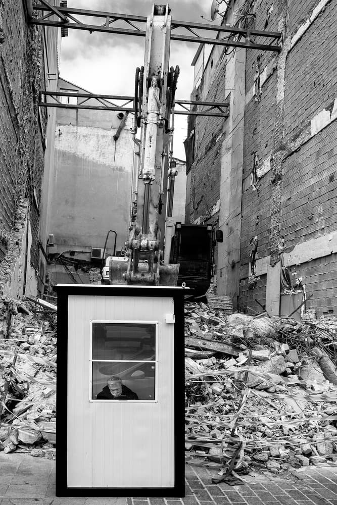 Man Watches Demolition by Jure Kravanja — canvas wall art