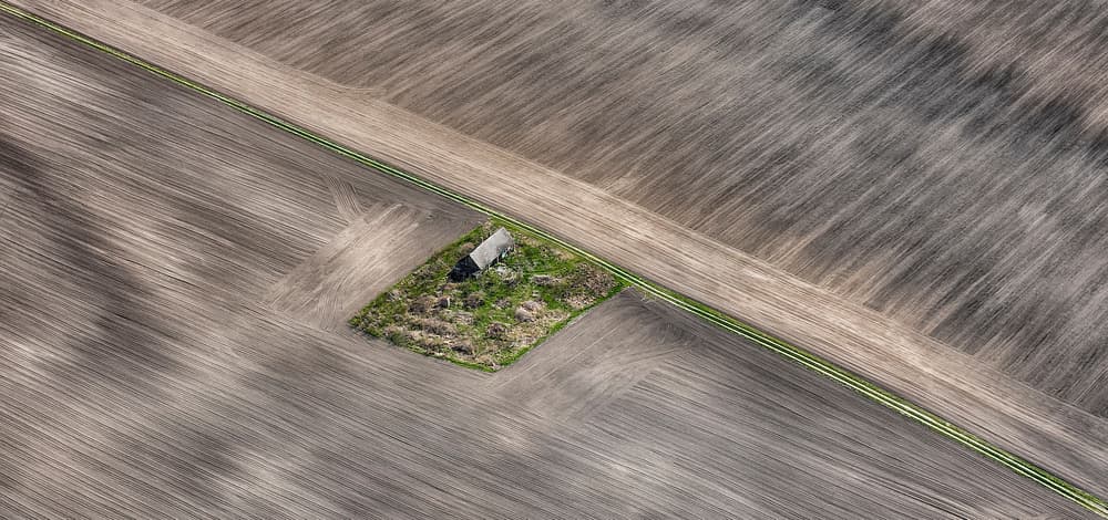 Isolated Farm Island by Krisztina Lacz — canvas wall art