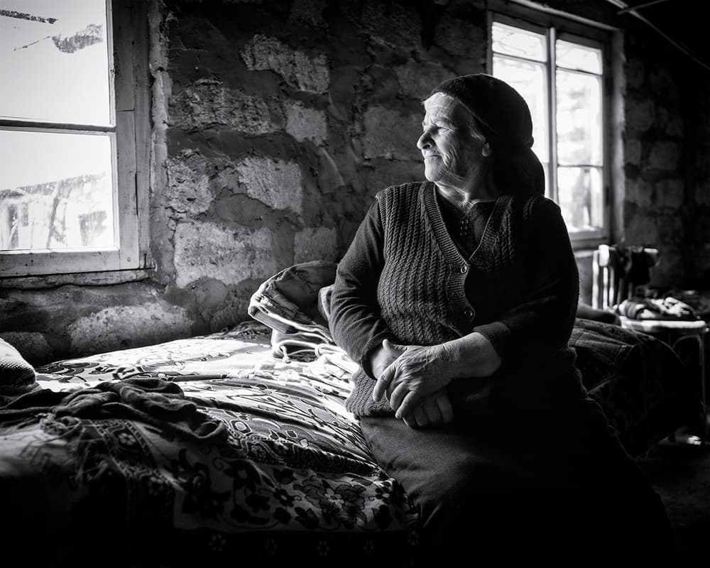 Thoughtful Woman By Window by Marcel Rebro — canvas wall art