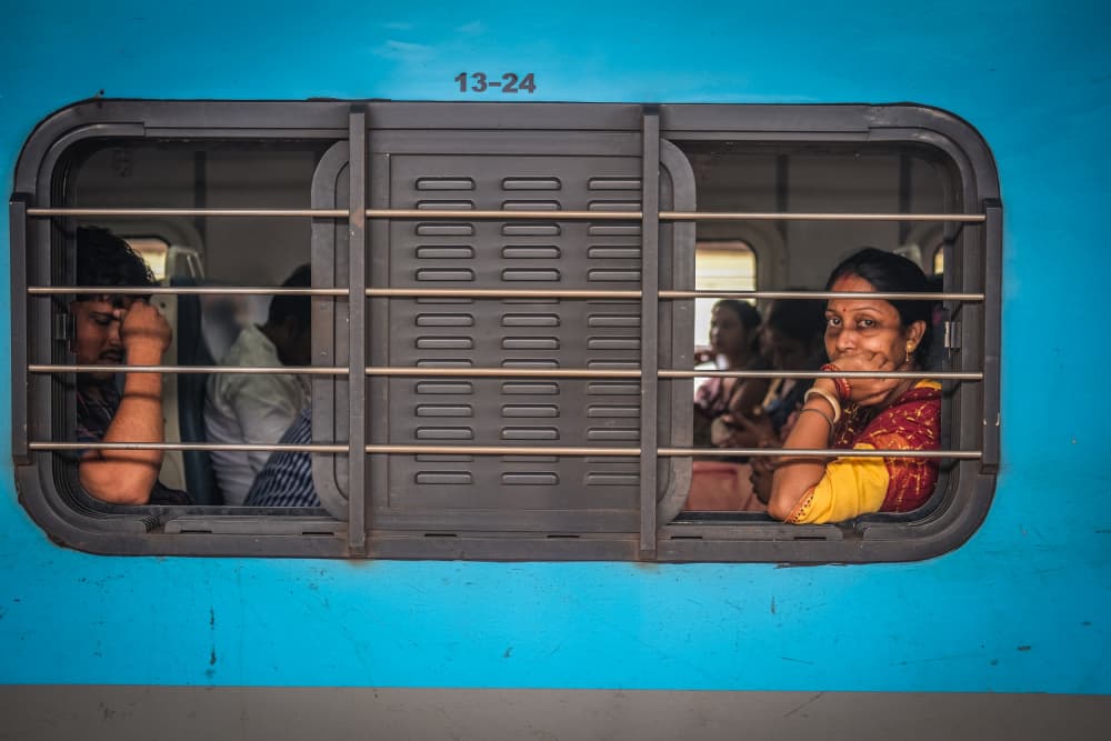Train Window Smiles by Subhajit Das — canvas wall art