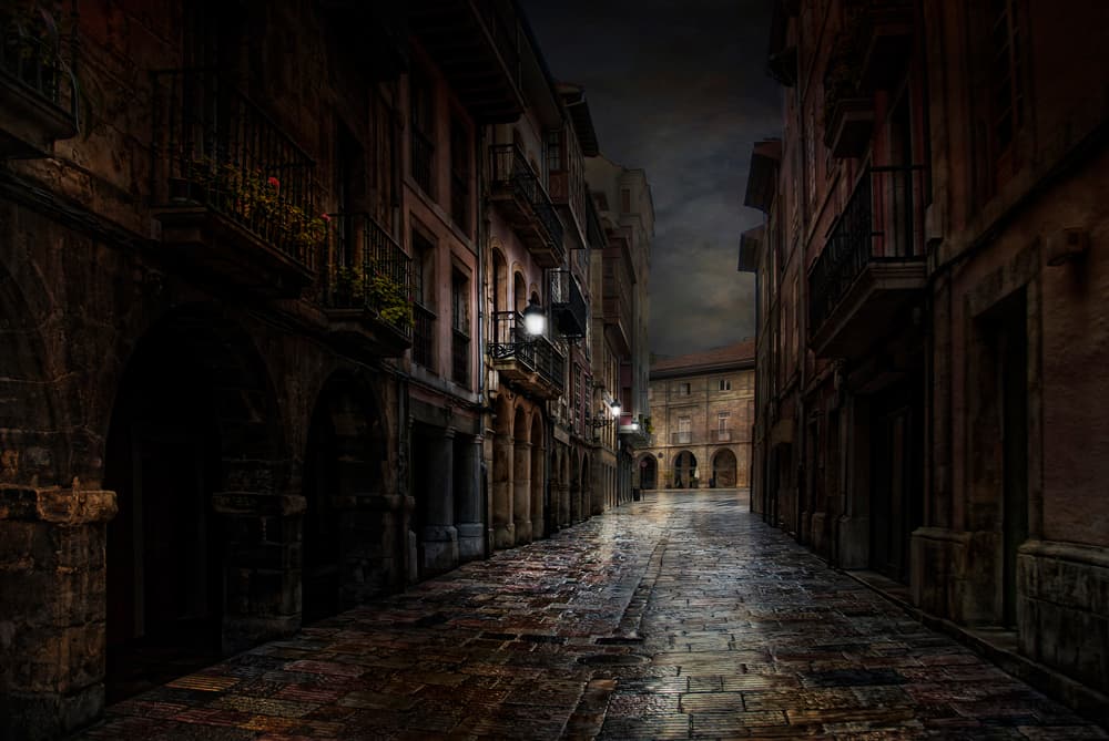 Rainy Old Town Street by Jose C. Lobato — canvas wall art