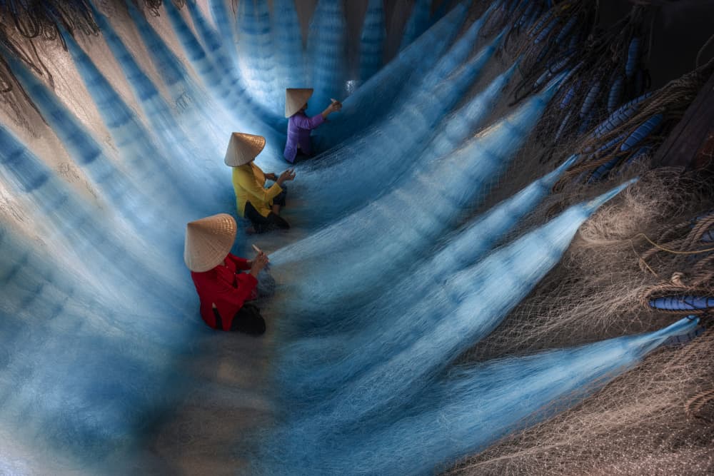 Women Mending Fishing Nets by Jorge Ruiz Dueso — canvas wall art