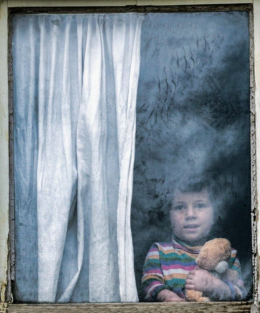 Child by Smoky Window by durmusceylan — canvas wall art