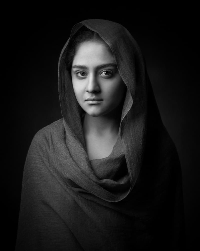 Serene Woman Portrait by Mehdi Mokhtari — canvas wall art