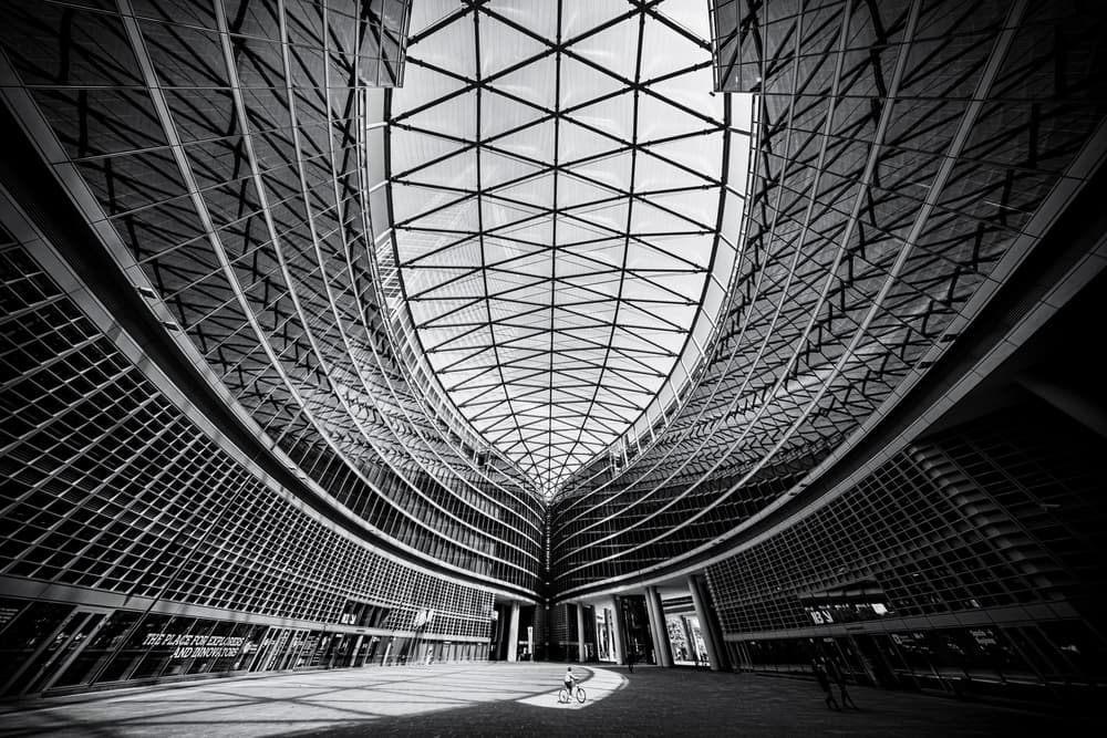 Curved Glass Building by Marco Tagliarino — canvas wall art