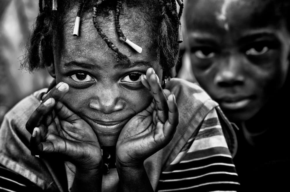 Innocent Children Smiling by Joxe Inazio Kuesta Garmendia — canvas wall art