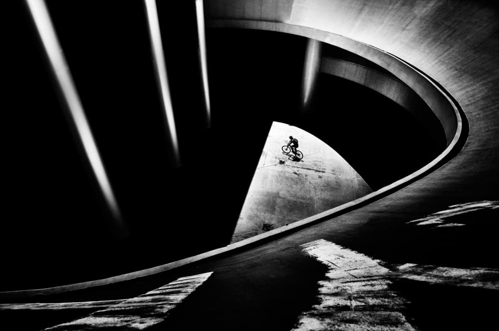 Geometric Arch Cyclist by Antonio Grambone — canvas wall art