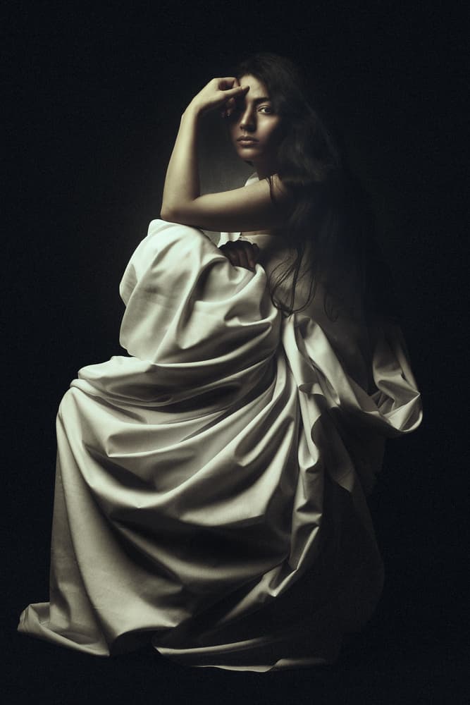 Pensive Draped Figure by Mehdi Mokhtari — canvas wall art