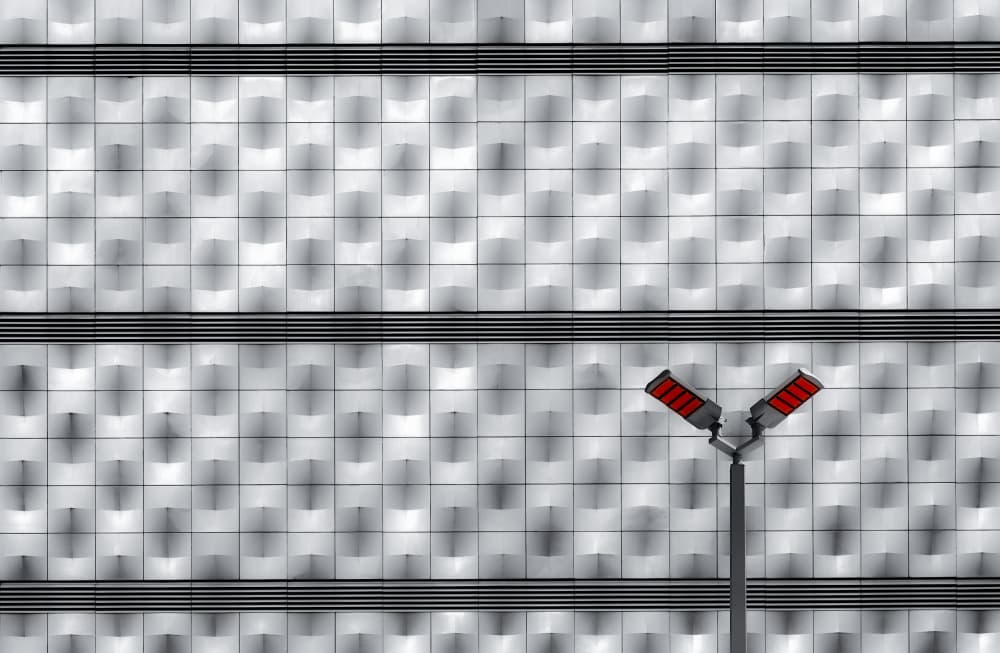 Red Lights on Modern Facade by Roland M Schwerdtfeger — canvas wall art