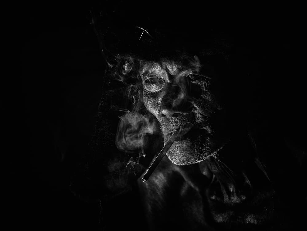 Mysterious Pipe Smoker by Andi Halil — canvas wall art