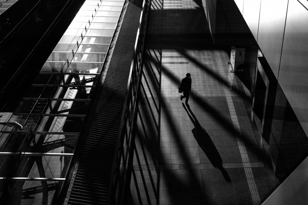 Man Walking City Shadows by Takaaki Ishikura — canvas wall art