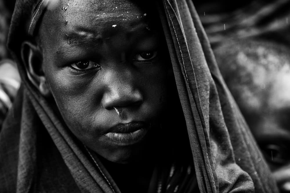 Young Boy Rainy Gaze by Goran Jovic — canvas wall art