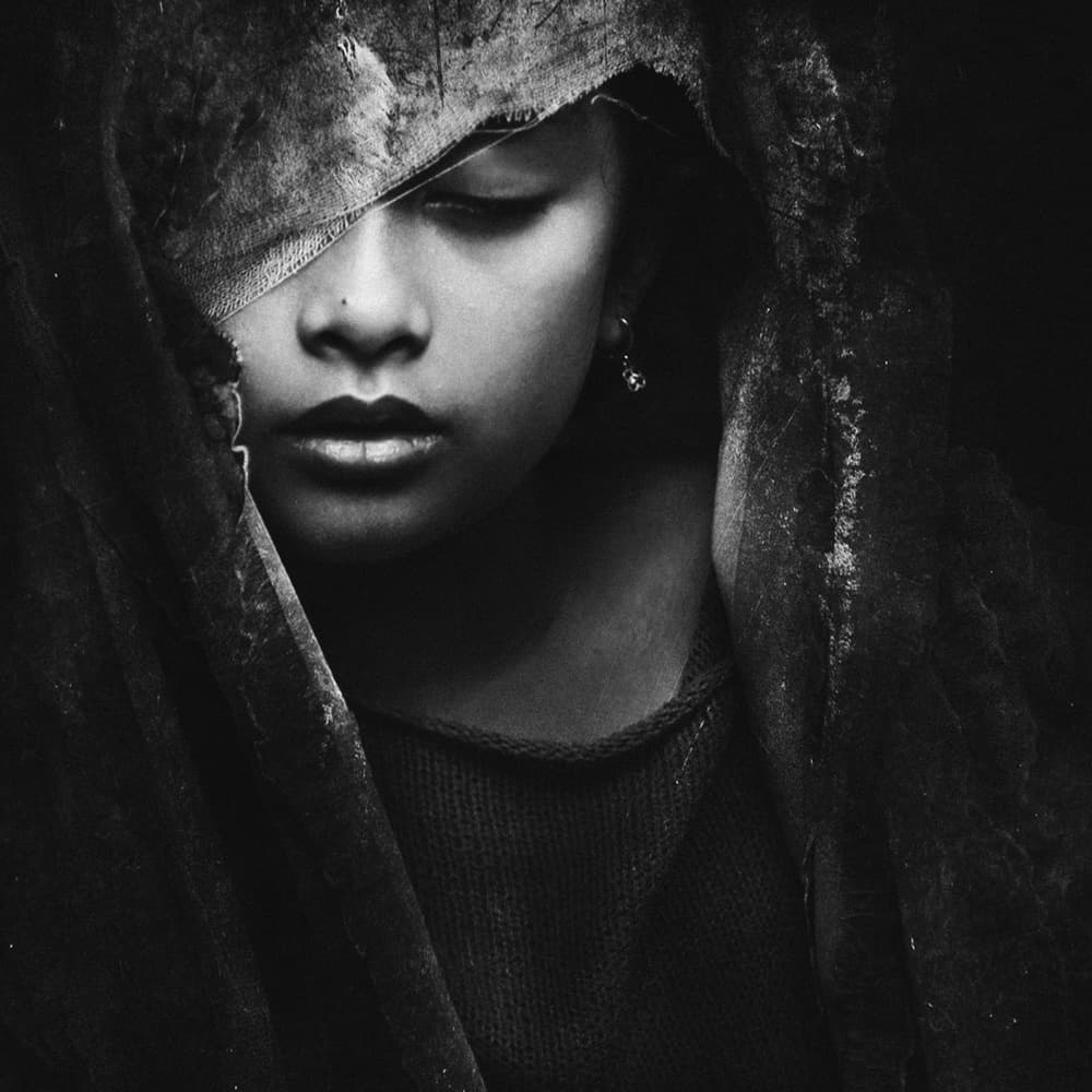 Pensive Hooded Woman by Hari Sulistiawan — canvas wall art