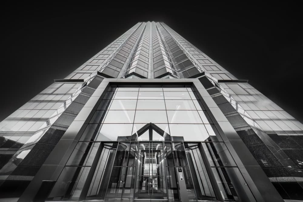 Towering Glass Skyscraper by Mike He — canvas wall art