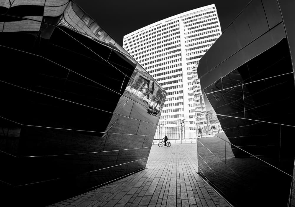Modern Geometry with Cyclist by Adam Street Photographer — canvas wall art