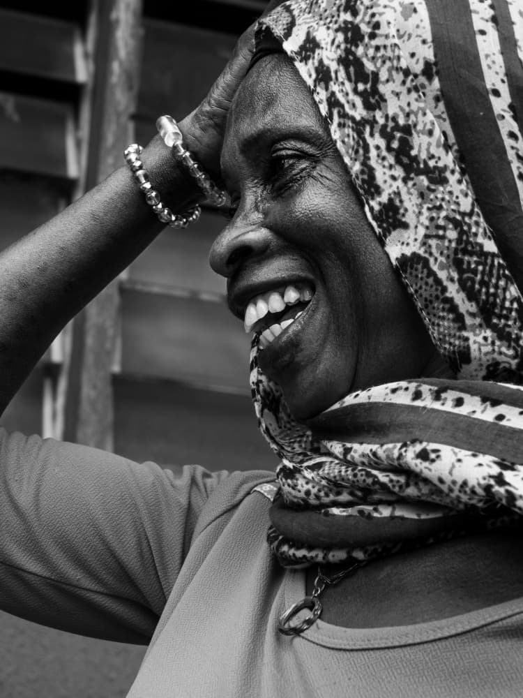 Joyful Woman Smiling by Elena Molina — canvas wall art