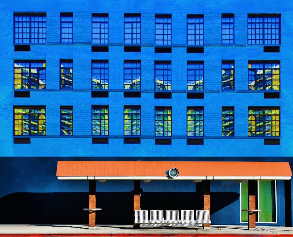 Bright Blue Bus Stop by Arnon Orbach — canvas wall art