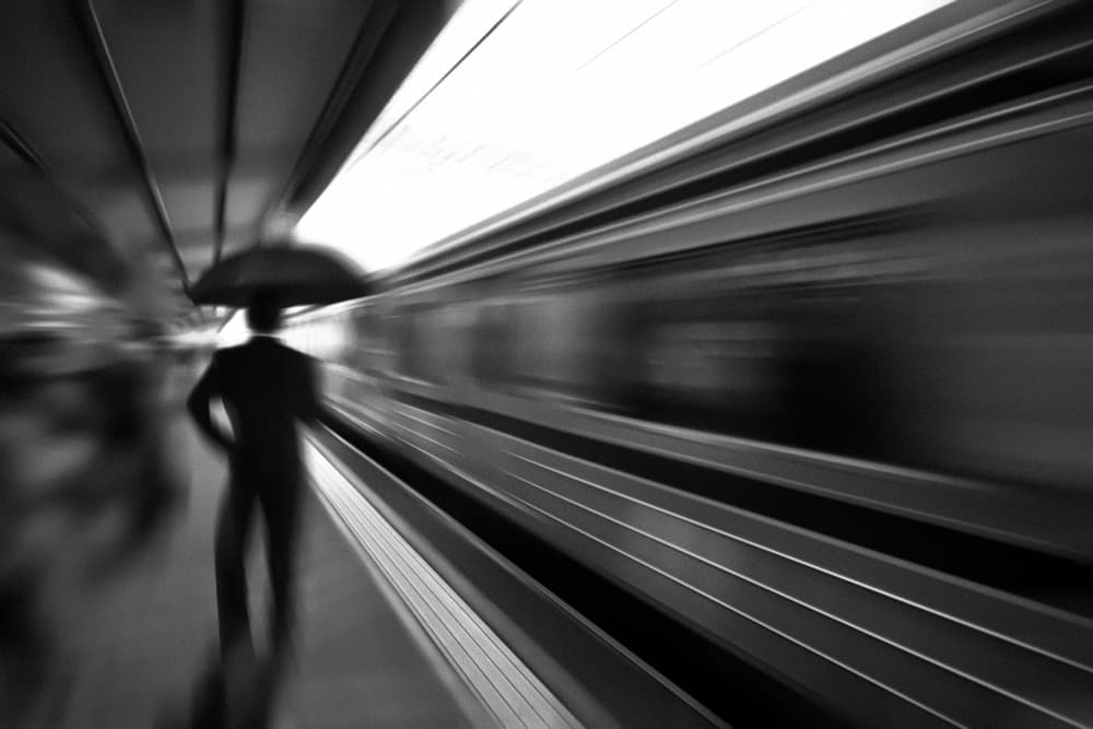 Man and Speeding Train by Antonyus Bunjamin (Abe) — canvas wall art