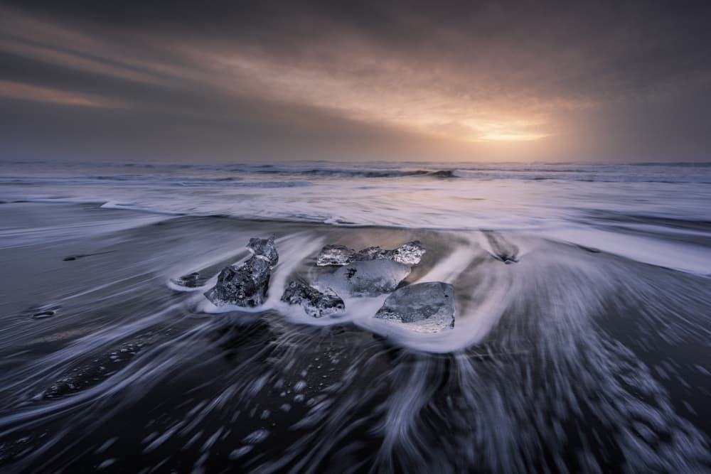 Icy Black Sand Beach by Jorge Ruiz Dueso — canvas wall art
