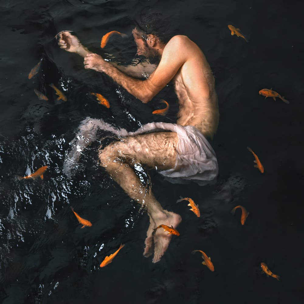 Man and Goldfish Dream by Hooman Sedaghi — canvas wall art