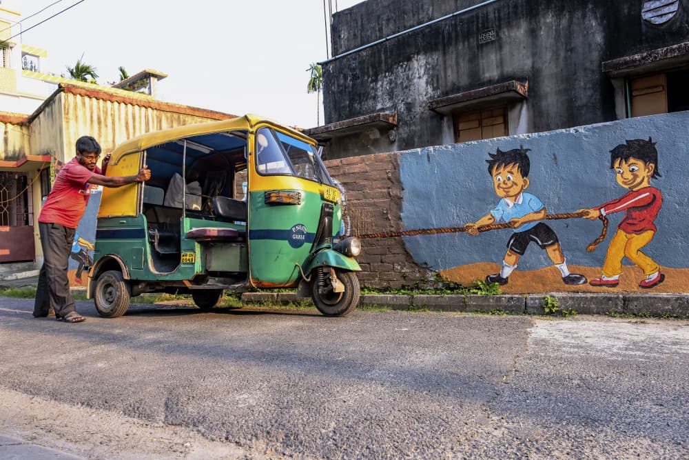 Rickshaw Mural Tug-of-War by Ajit Kumar Majhi — canvas wall art
