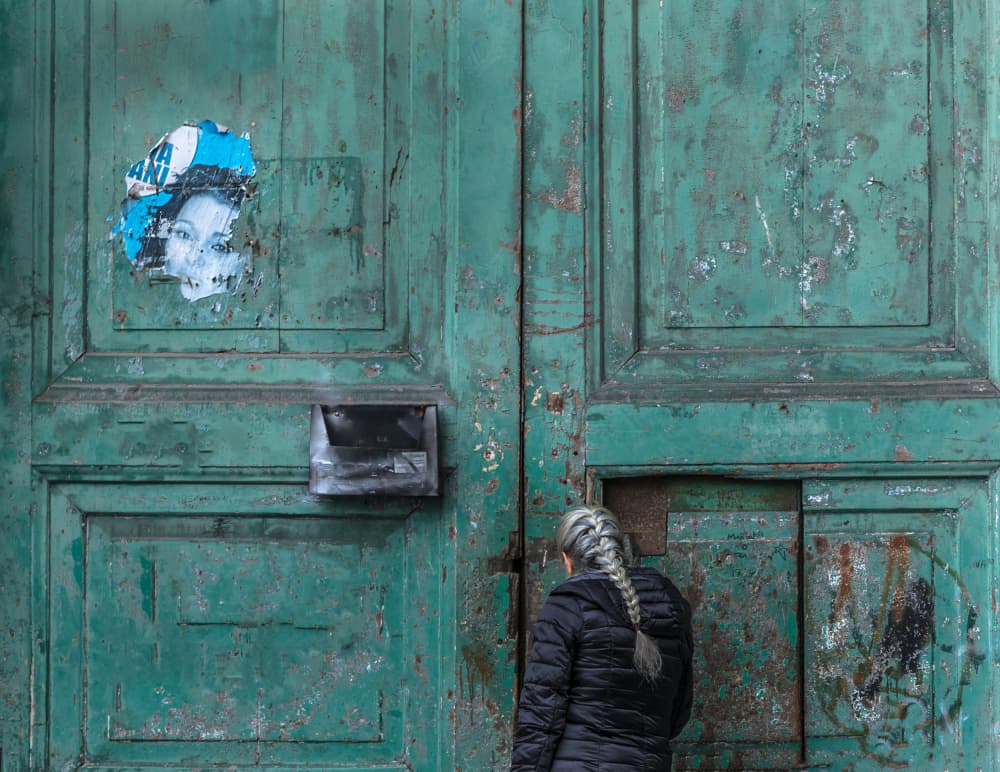 Woman by Grungy Green Door by Ömer Ates Kızıltug — canvas wall art