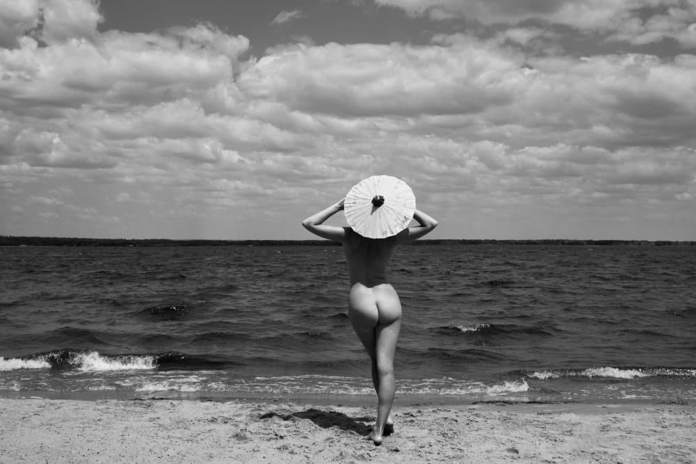 Serene Beach Parasol by Mikhail Faletkin — canvas wall art