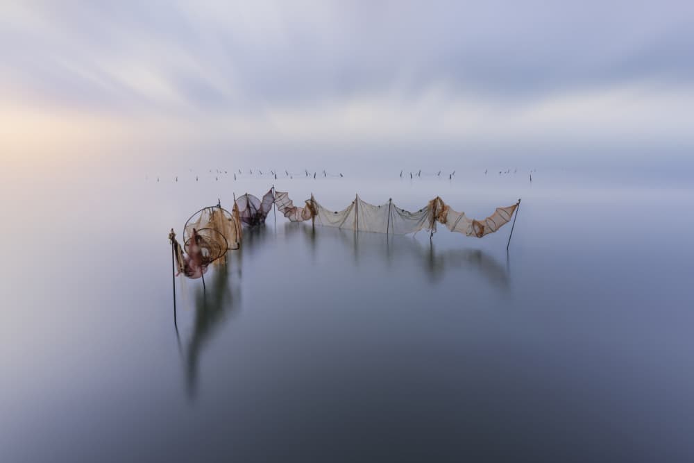 Misty Fishing Nets by Jorge Ruiz Dueso — canvas wall art