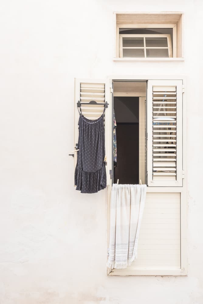 Hanging Dress Window by Photolovers — canvas wall art