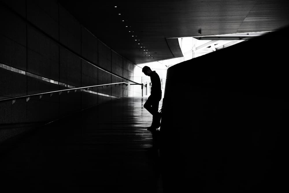 Solitary Figure Dark Hallway by Reiko kiri — canvas wall art