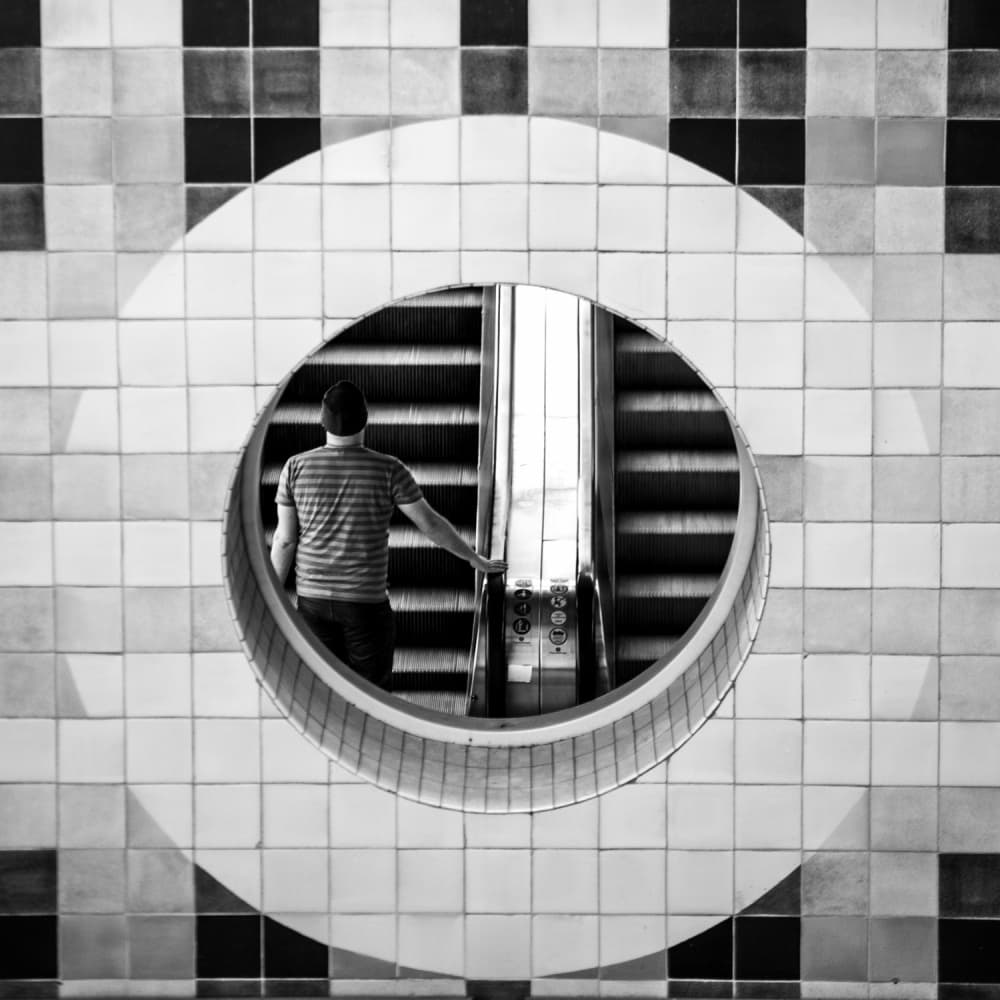 Man at Escalator Portal by Milena Seita — canvas wall art