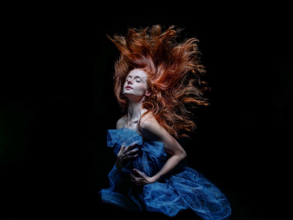 Floating Redhead Blue by Sam SDFMedia — canvas wall art