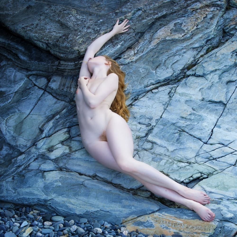 Serene Nude on Rocks by Catchlight Studio — canvas wall art
