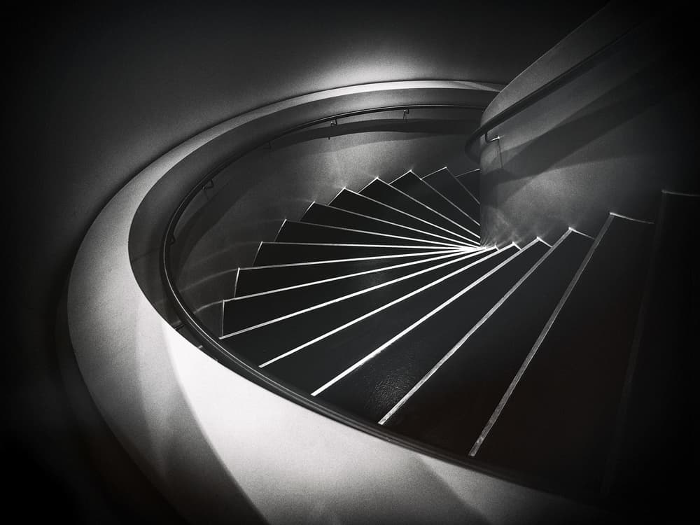 Dark Spiral Staircase by Holger Droste — canvas wall art