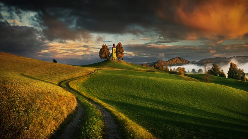 Golden Hillside Church Path by Krzysztof Browko — canvas wall art