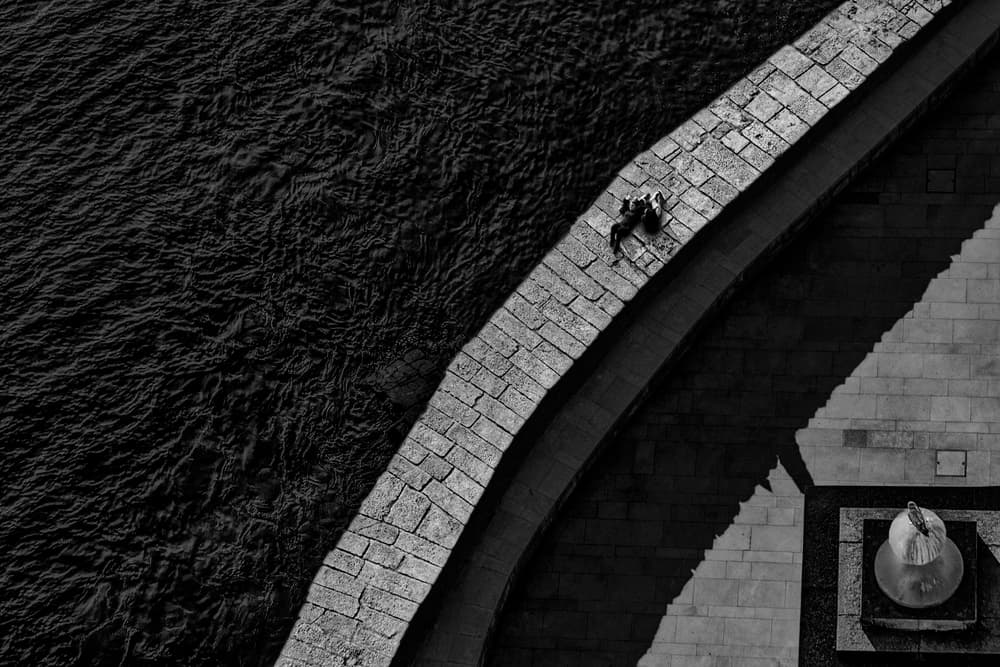 Lone Figure on Bridge by Paulo Abrantes — canvas wall art