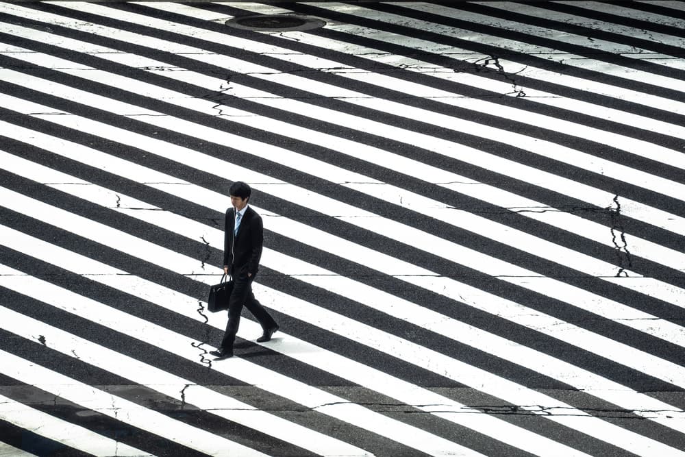 Man Crossing Zebra Stripes by Tetsuya Hashimoto — canvas wall art