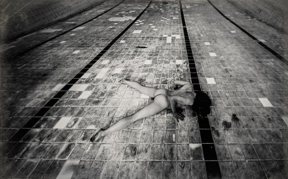 Solitary Figure Empty Pool by Bogdan Bouşcă — canvas wall art