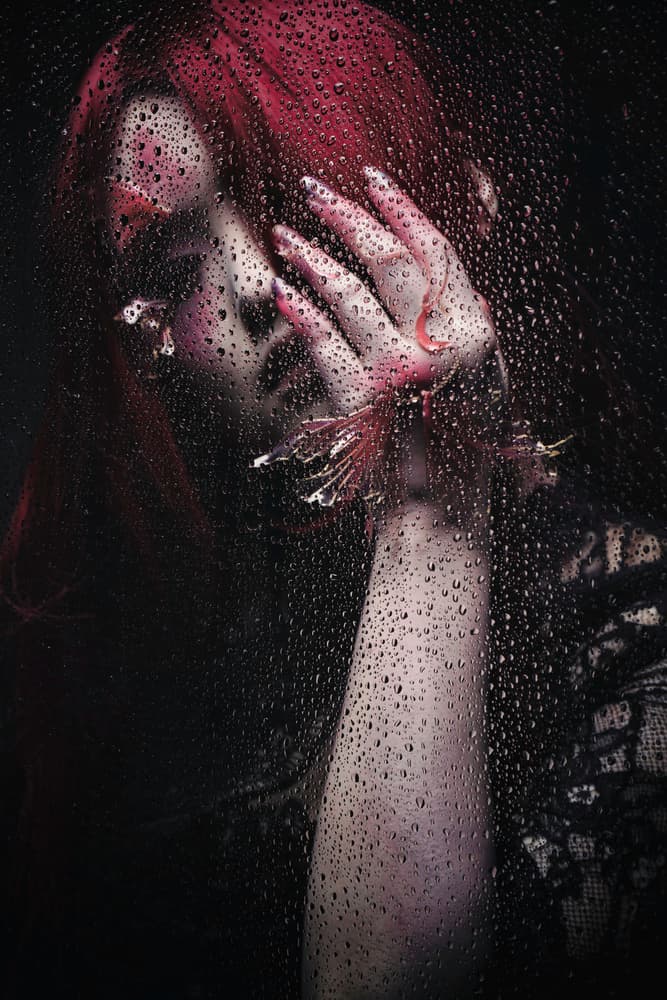 Woman Through Rainy Glass by KOIKI — canvas wall art