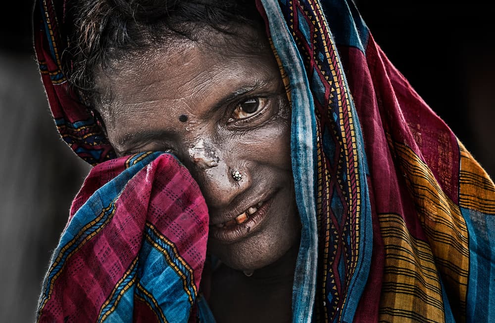 Woman at the Kumbh Mela - Prayagraj - India by Joxe Inazio Kuesta Garmendia — canvas wall art