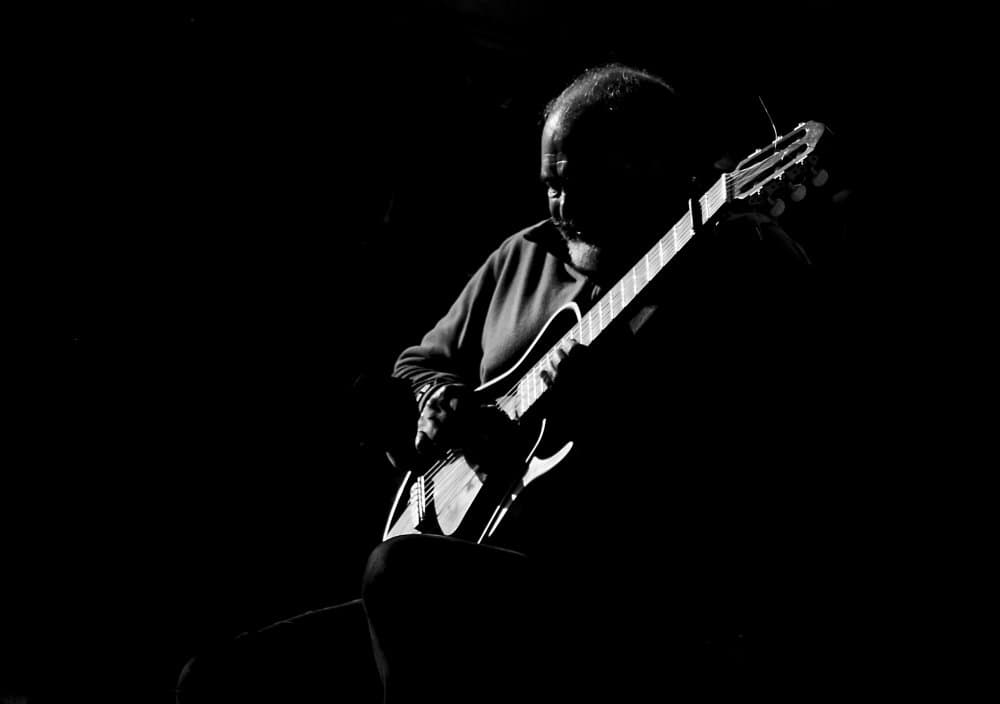 Moody Guitar Player by Adolfo Urrutia — canvas wall art