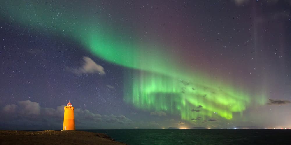 Northern Lights Lighthouse by Judith Kuhn — canvas wall art