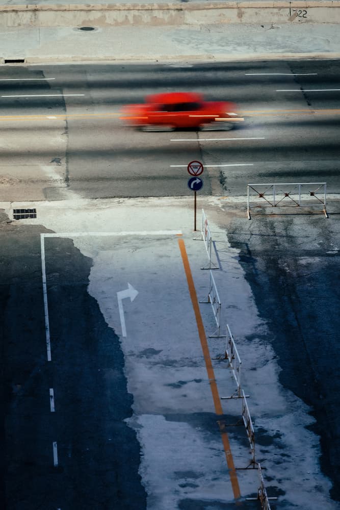 Speeding Red Car by Andy Bauer — canvas wall art