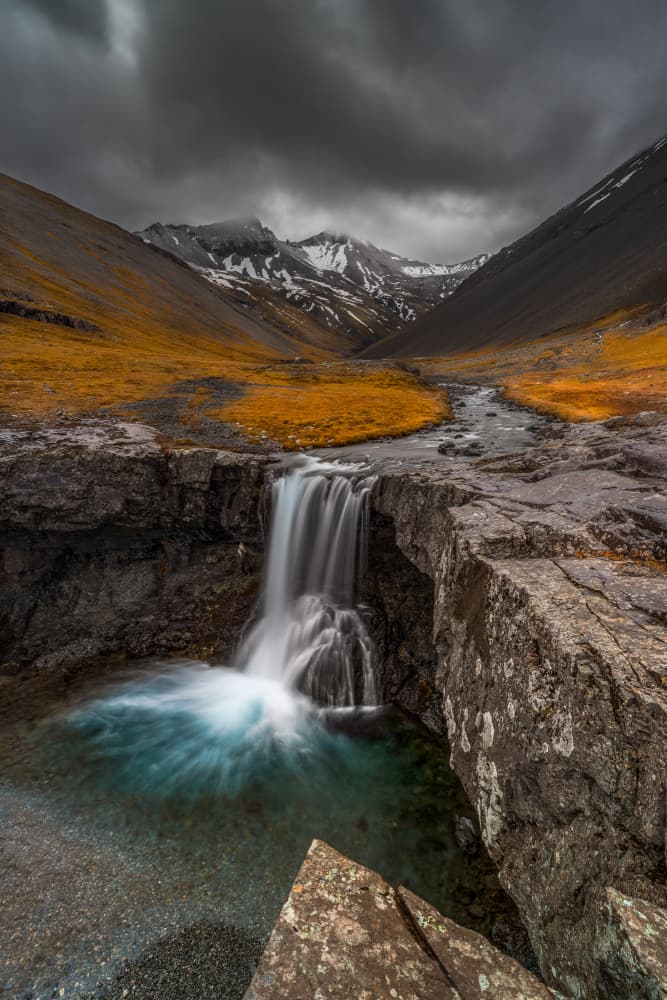 Moody Mountain Waterfall by Jacek Swiercz — canvas wall art