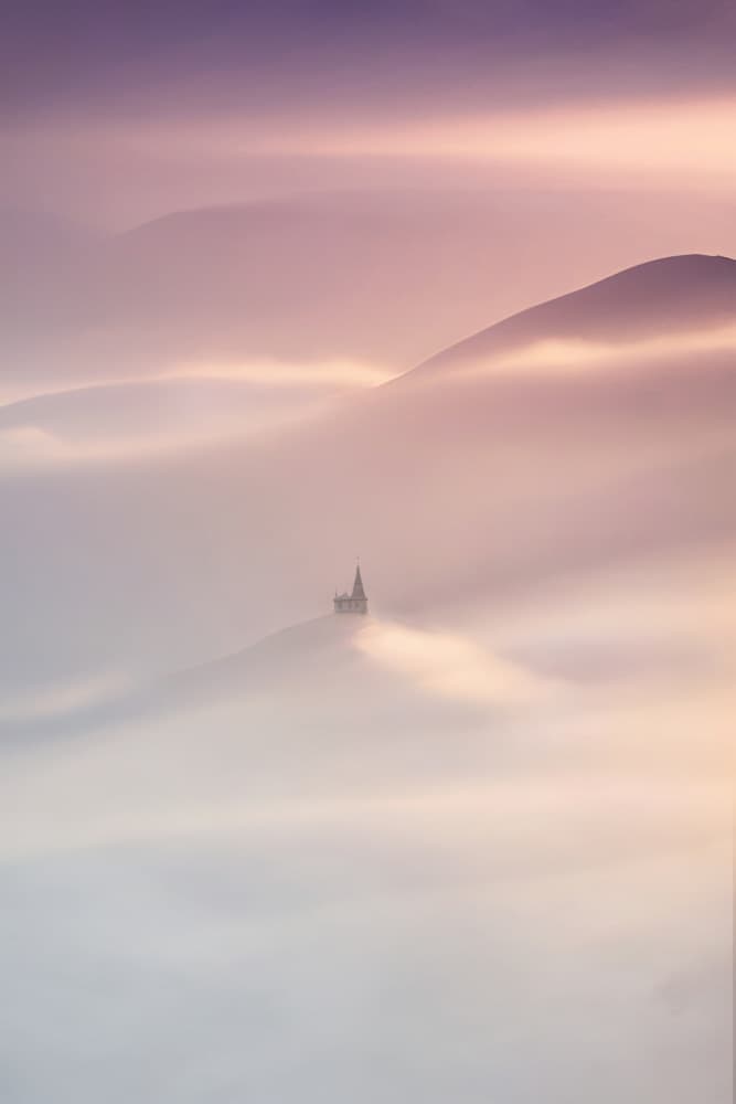 Misty Hilltop Church by Manu Allicot — canvas wall art