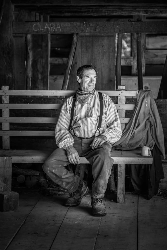 Thoughtful Man Rustic Bench by Miroslaw Prybinski — canvas wall art