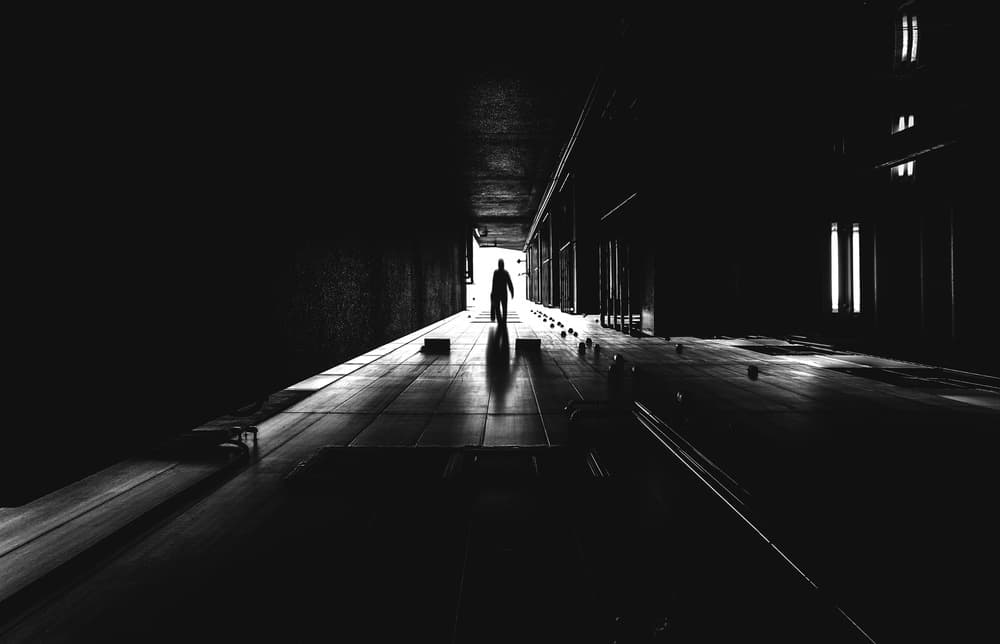 Lone Figure Down Dark Hall by Takashi Suzuki — canvas wall art