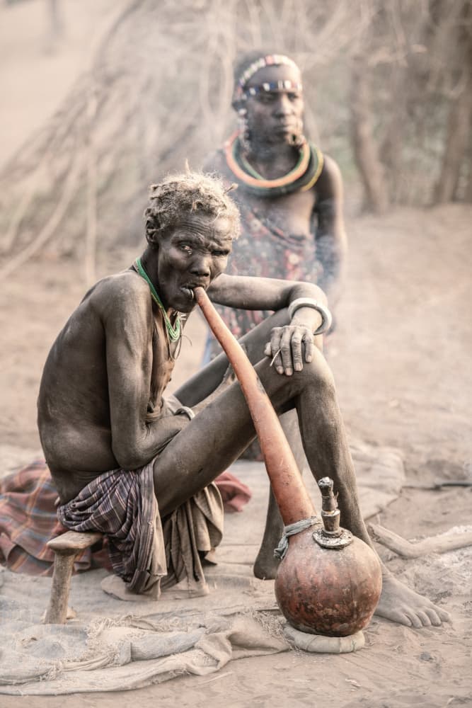 African Elder Smoking Pipe by Trevor Cole — canvas wall art