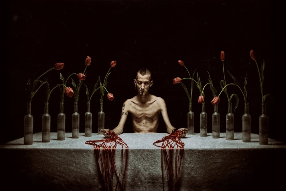 Man's Red Offering by mario lotzin / uwe friessner — canvas wall art