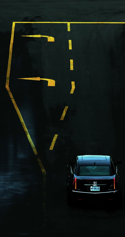 Sleek Car Wet Road by Jian Wang — canvas wall art
